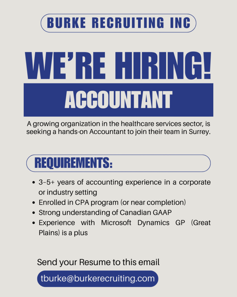 Professional accountant working on financial reports in a modern Surrey office, showcasing the available Accountant Job in Surrey.