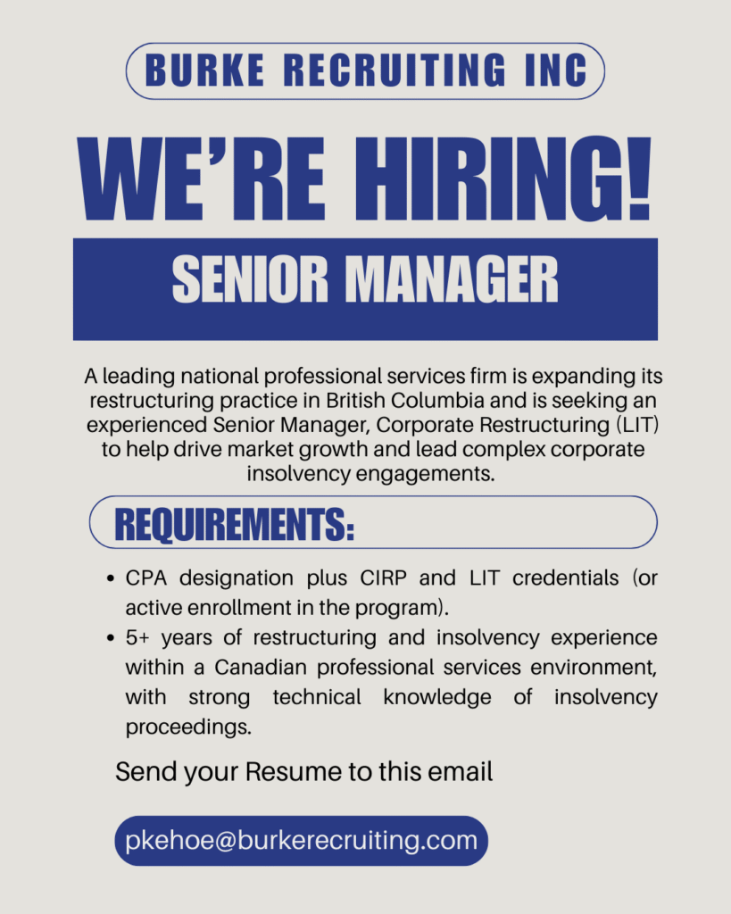 A professional business leader reviewing financial documents in a modern Vancouver office, representing a Senior Manager Job in Vancouver.